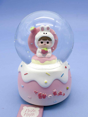 Снежный шар Девочка в костюме Кролика со звуком и подсветкой розовый 12 см