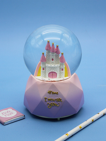 Снежный шар Замок со звуком и подсветкой розовый 12 см